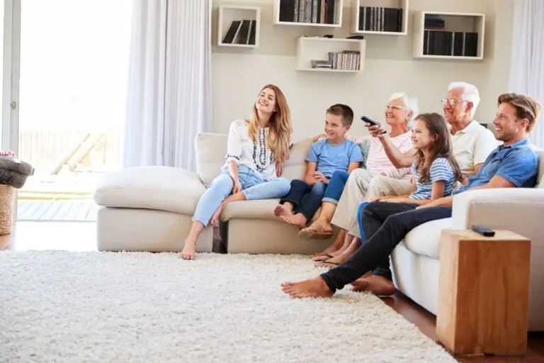 family at home watching tv