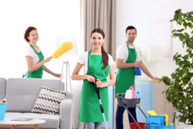 cleaning crew working in the living room